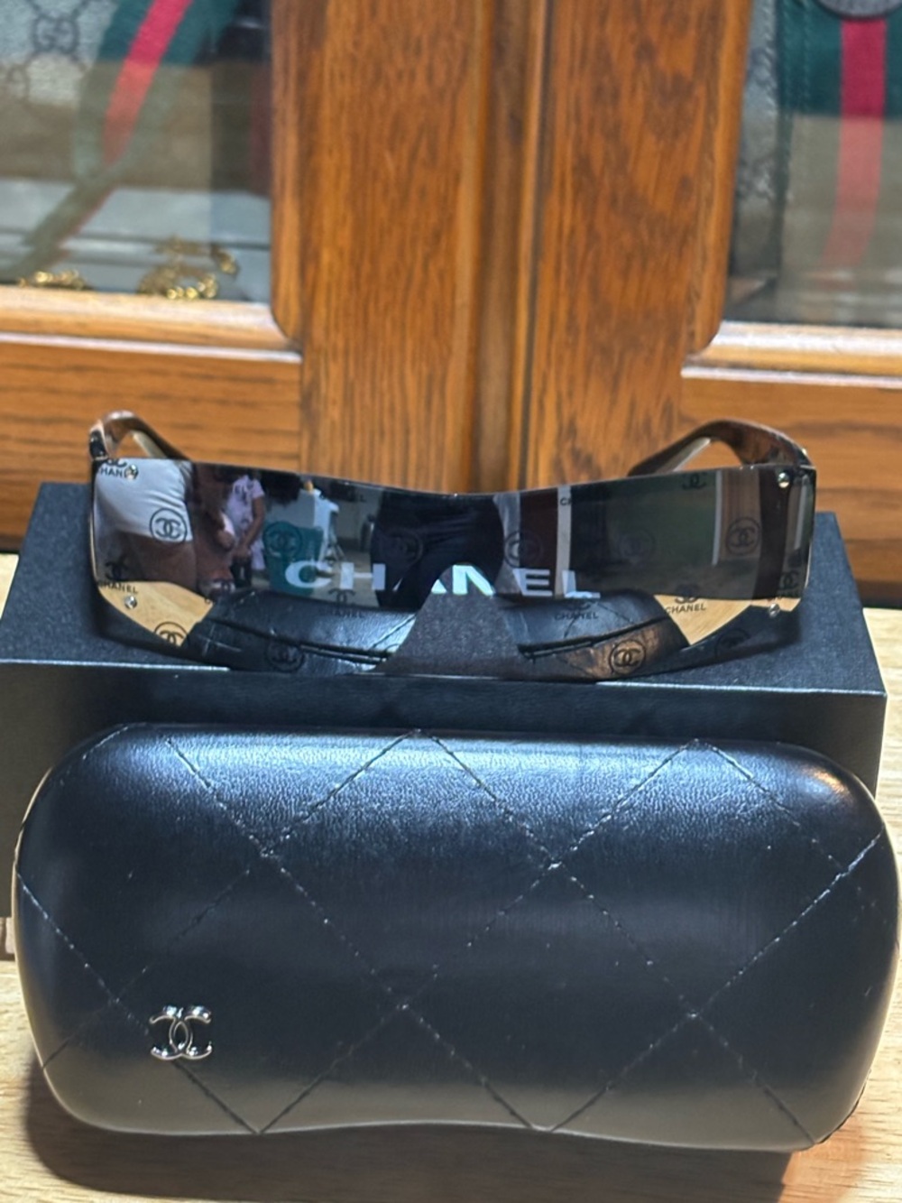 Classic CHANEL Logo Black Shield Sunglasses with Across Lens